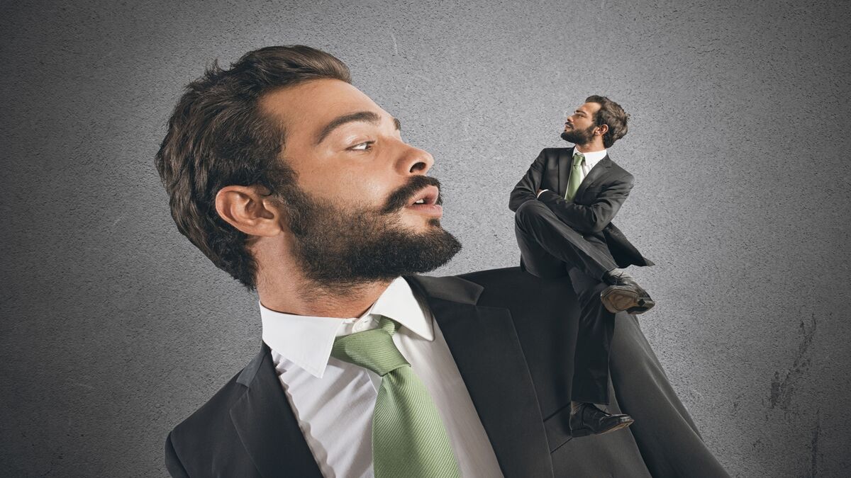 A man dressed in a suit and his conscience.