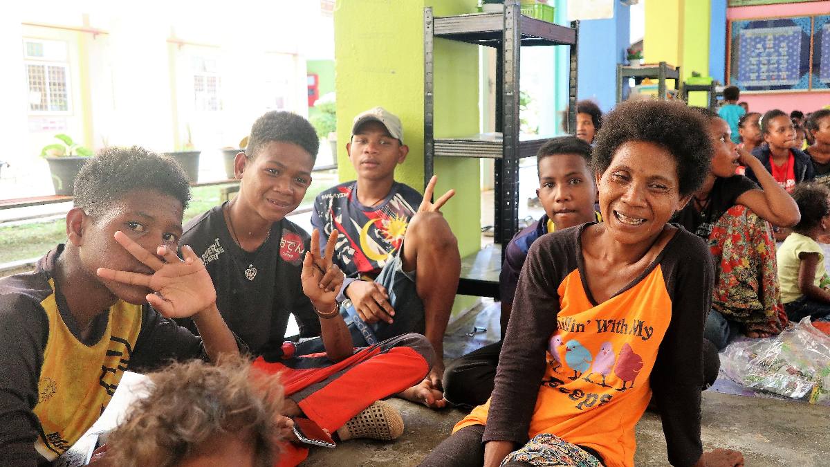 Indigenous Orang Asli group poses for the camera.