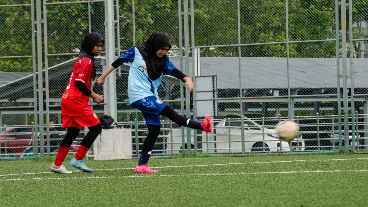 Girls in sports: Aspiring footballers participate in Jaguh RF's tournament at the Kuala Lumpur Sports Arena.